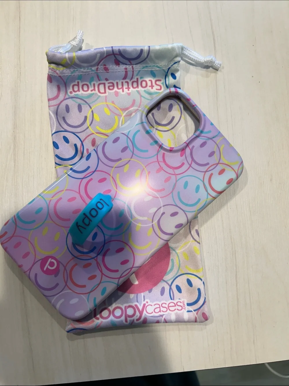Loopy Case Pink Multicolor Smiley Phone Case with Blue Loop (St. Jude collection